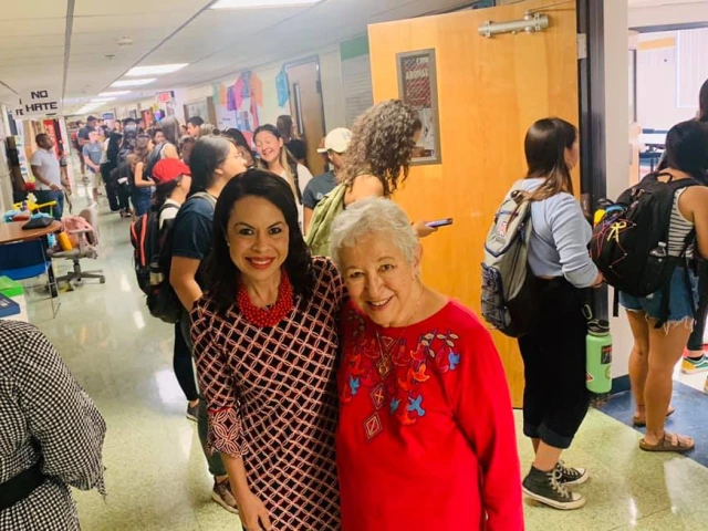 Dr. Marla Franco, AVP for HSI Initiatives with an AROMAS "Abuelita" 