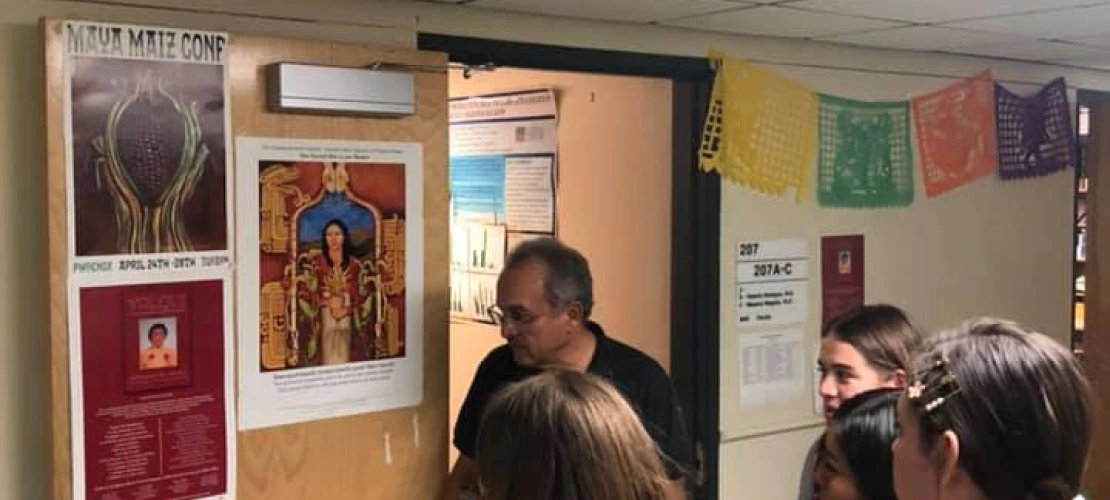 Ajo students visiting UA and speaking with faculty from the Mexican American Studies Department