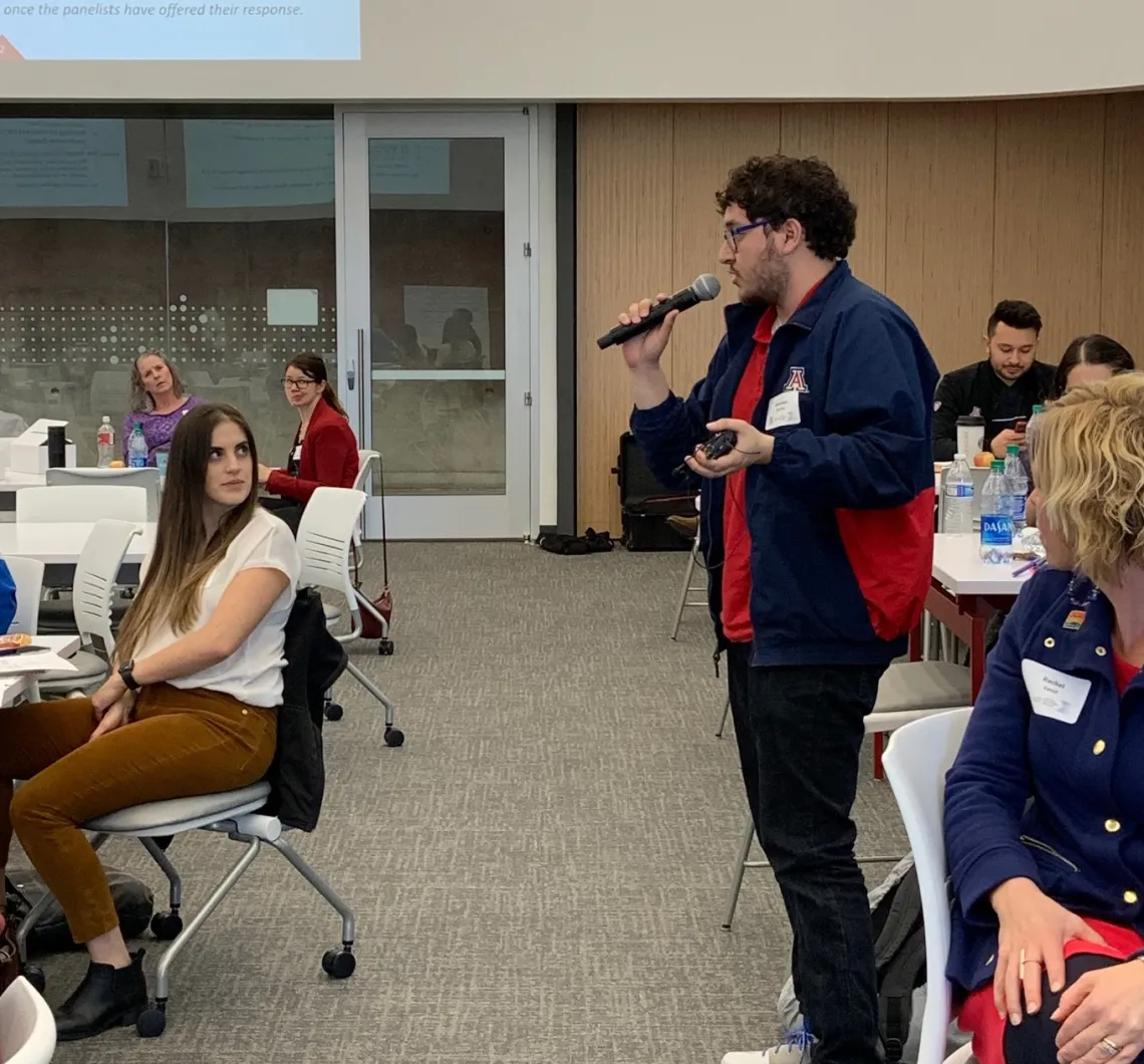 student from the Speech-Language and Hearing Cats organization speaking at the Tonwhall for Equity in STEM